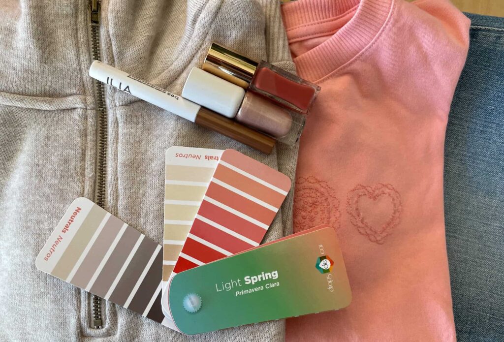 Light spring season outfit and makeup next to color swatches